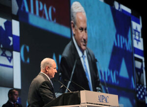 Benjamin Netanyahu stands at a podium